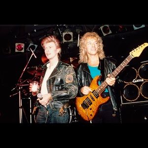 Shadows grow so long before my eyes
And they're